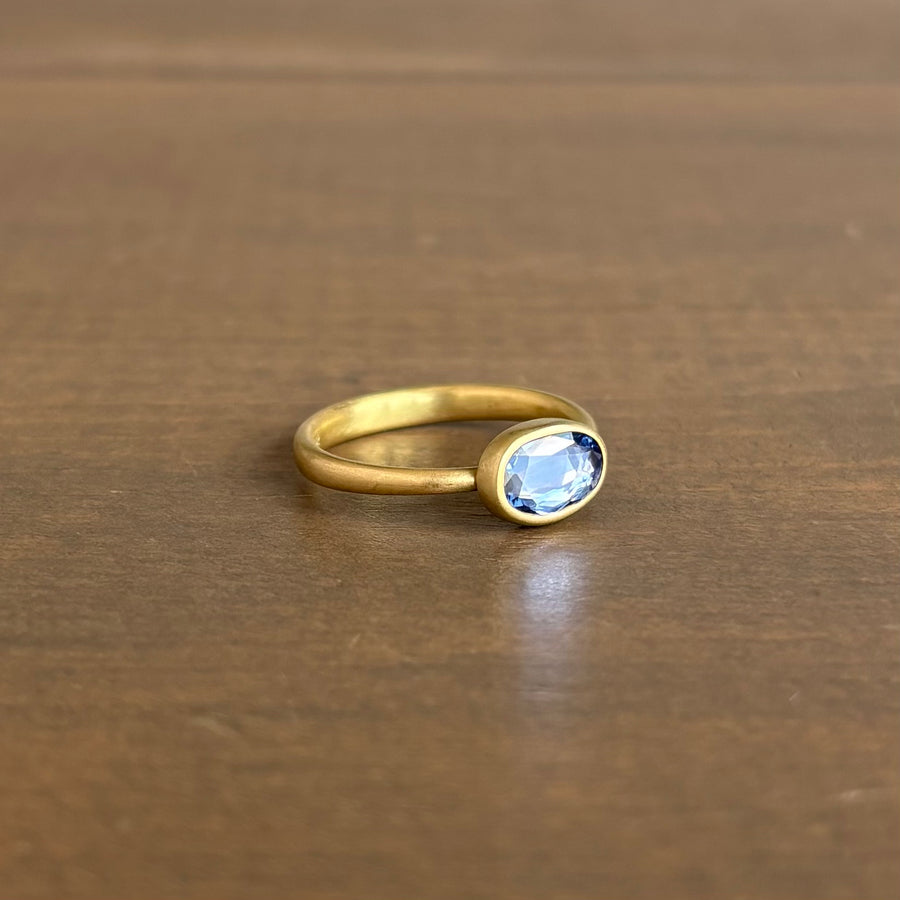 Ovalish Pale Blue Sapphire Sequin Ring