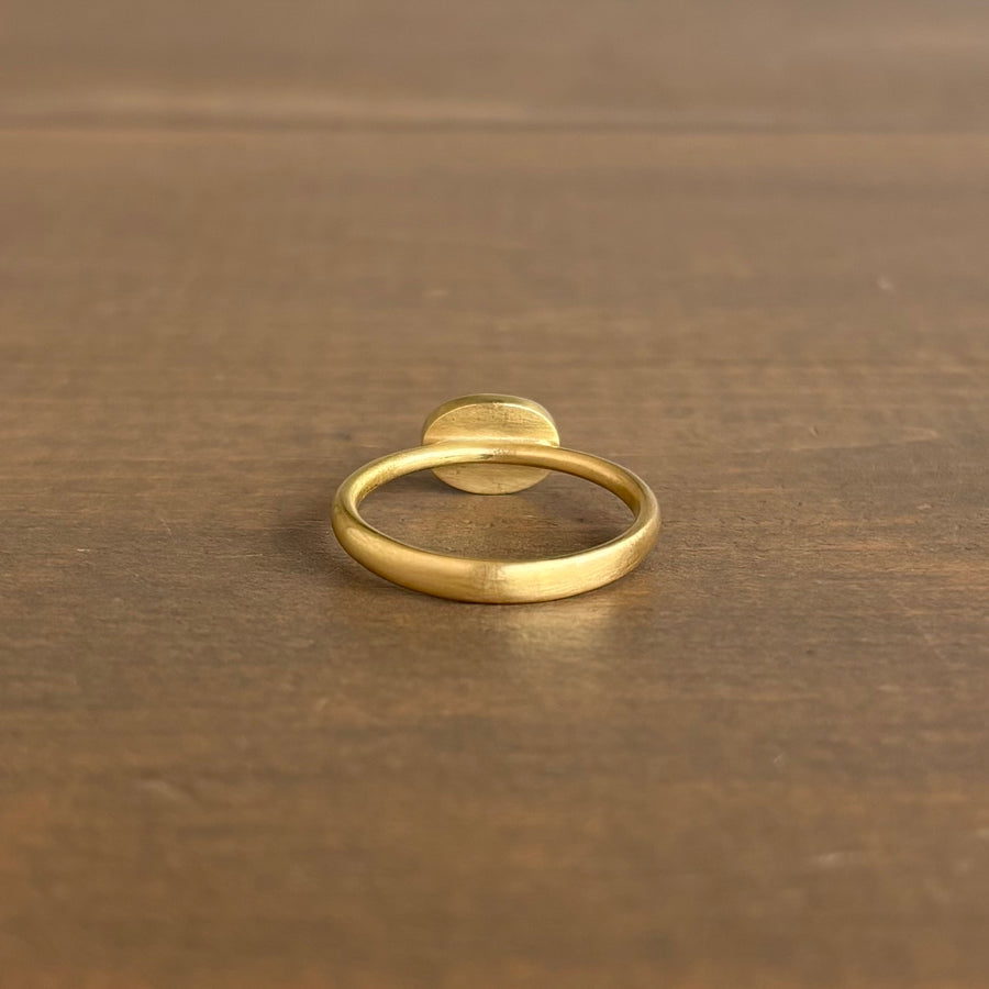 Ovalish Pale Blue Sapphire Sequin Ring