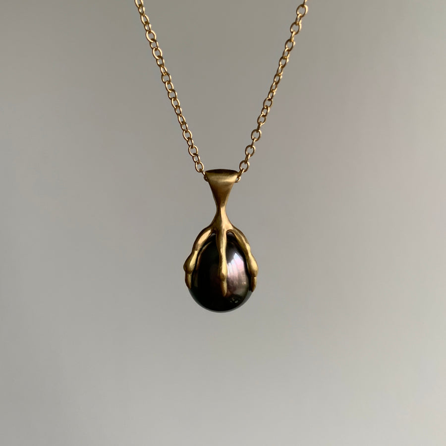 Annette Ferdinansen 10k Gold & Gray Tahitian Pearl Quail Egg Claw Pendant hanging