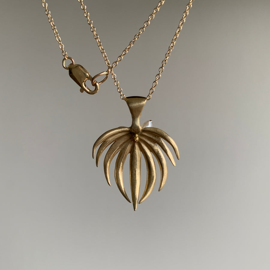 Annette Ferdinansen 10k Gold & Pearl Curled Fan Palm Pendant hanging back view