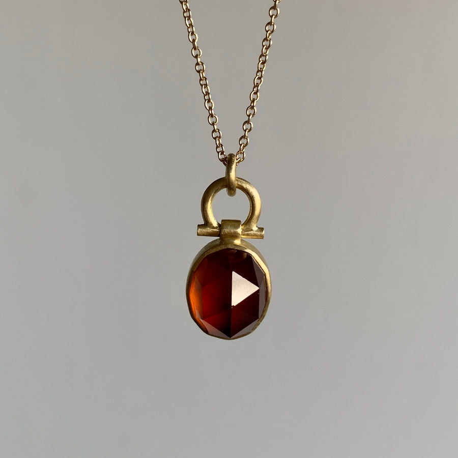 Faceted Oval Hessonite Garnet Dome Pendant by Monika Krol hanging view