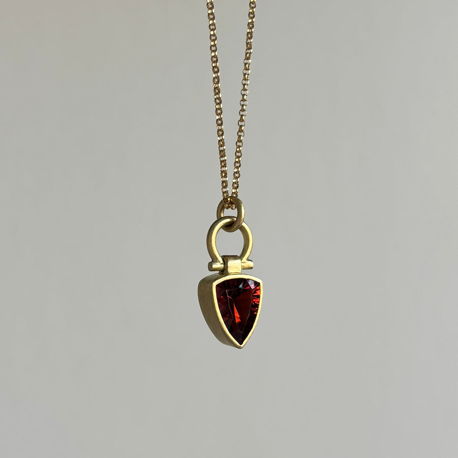 Fiery Red Garnet Elongated Trillion Pendant by Monika Krol hanging view