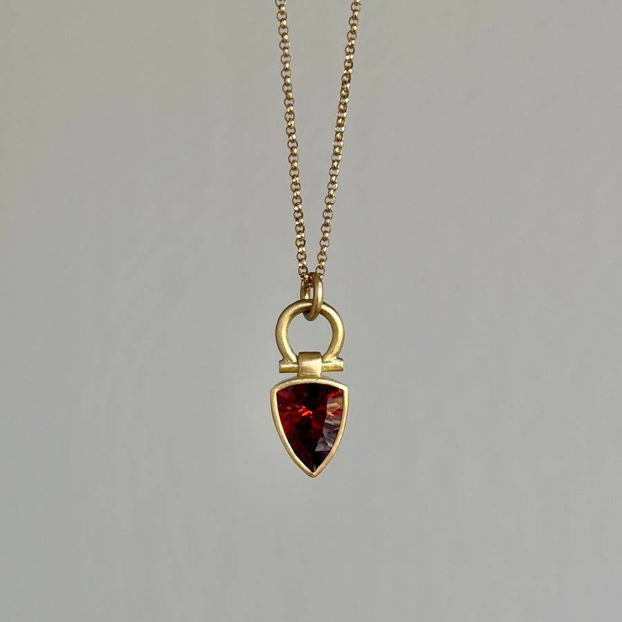 Fiery Red Garnet Elongated Trillion Pendant by Monika Krol side view 1