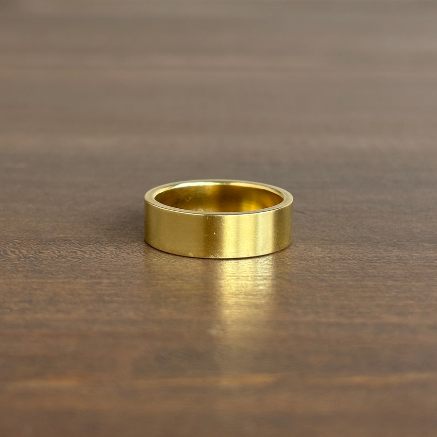 Gold diamond ring with a rectangular engraving back view