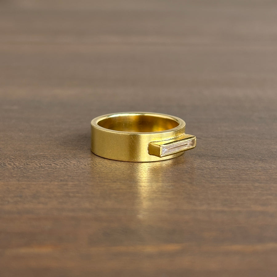 Gold diamond ring with a rectangular engraving side view