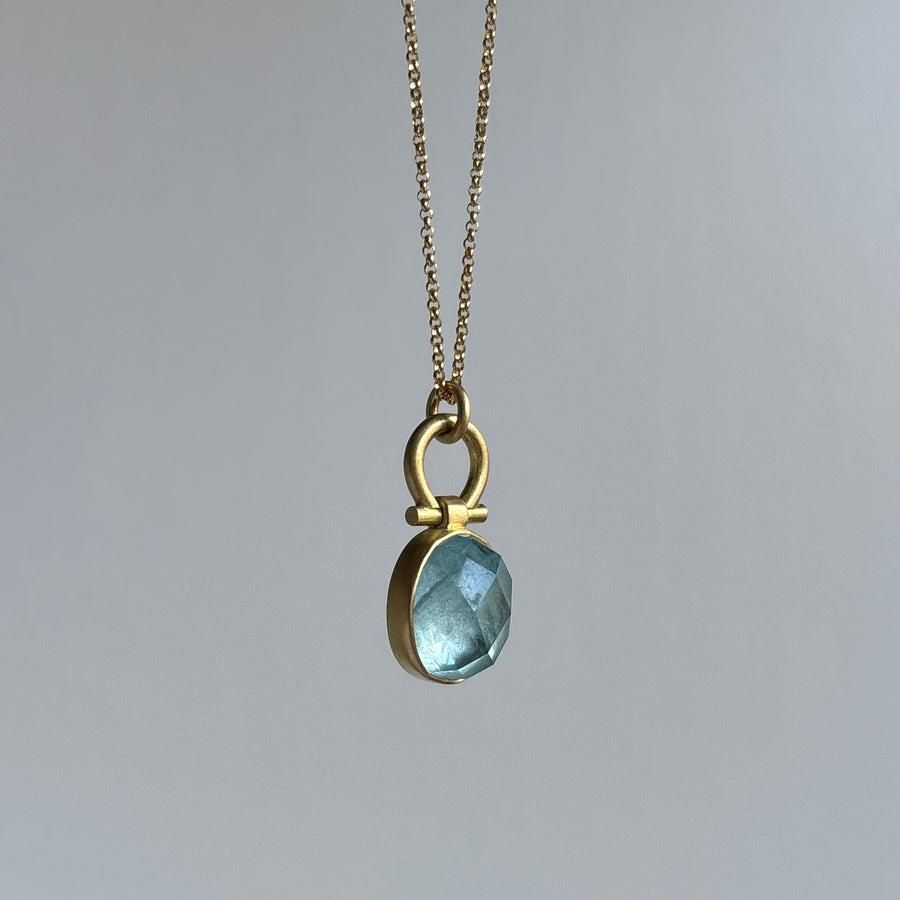 Oval Checker Cut Aquamarine Pendant by Monika Krol hanging view