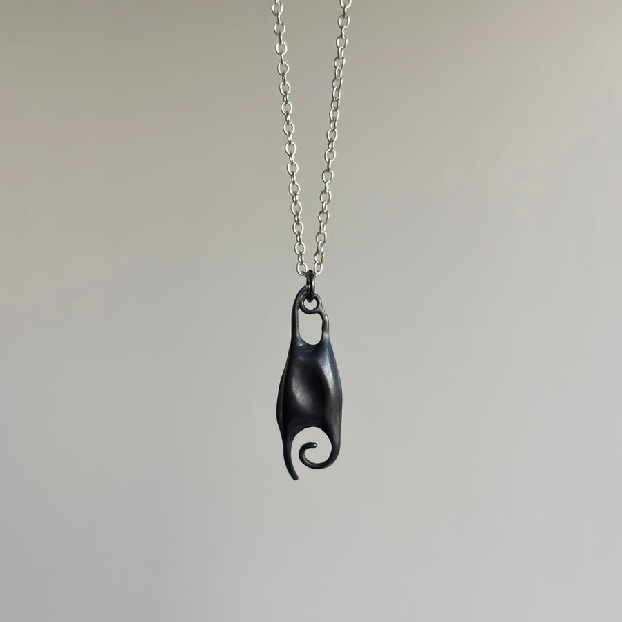 Little Silver Skate Egg Pendant