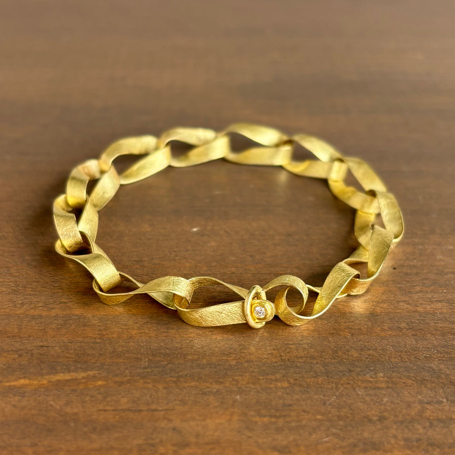 Gold Mobius Link Bracelet with Diamond Clasp