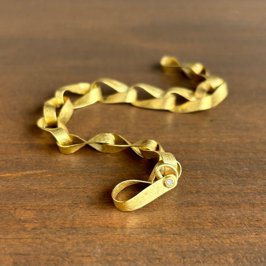 Gold Mobius Link Bracelet with Diamond Clasp