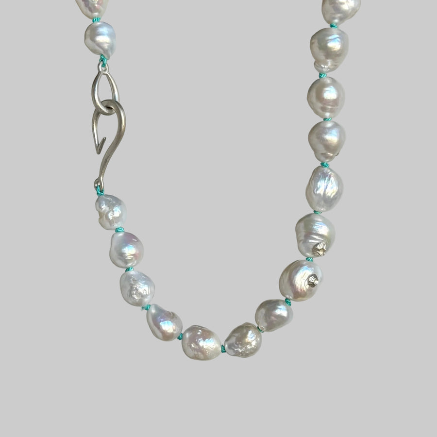 Tideline Pearl Ruthie B. Necklace with Sterling Silver Clasp hanging