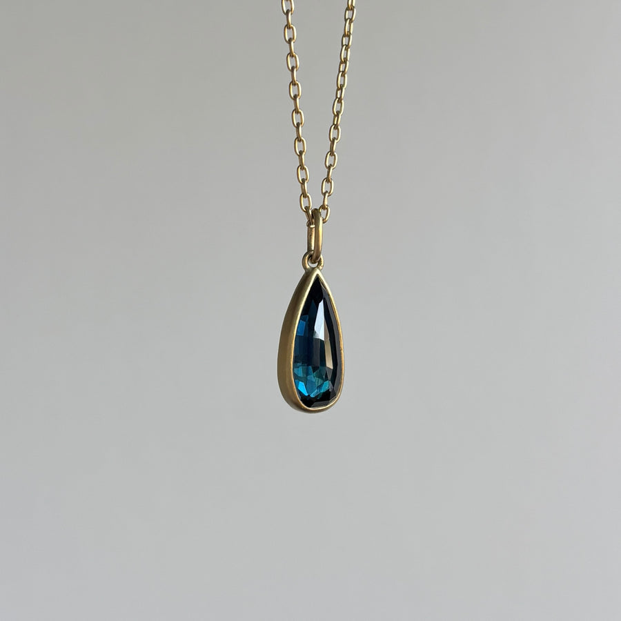 Lola Brooks Blue Sapphire Droplet Pendant necklace hanging view 1