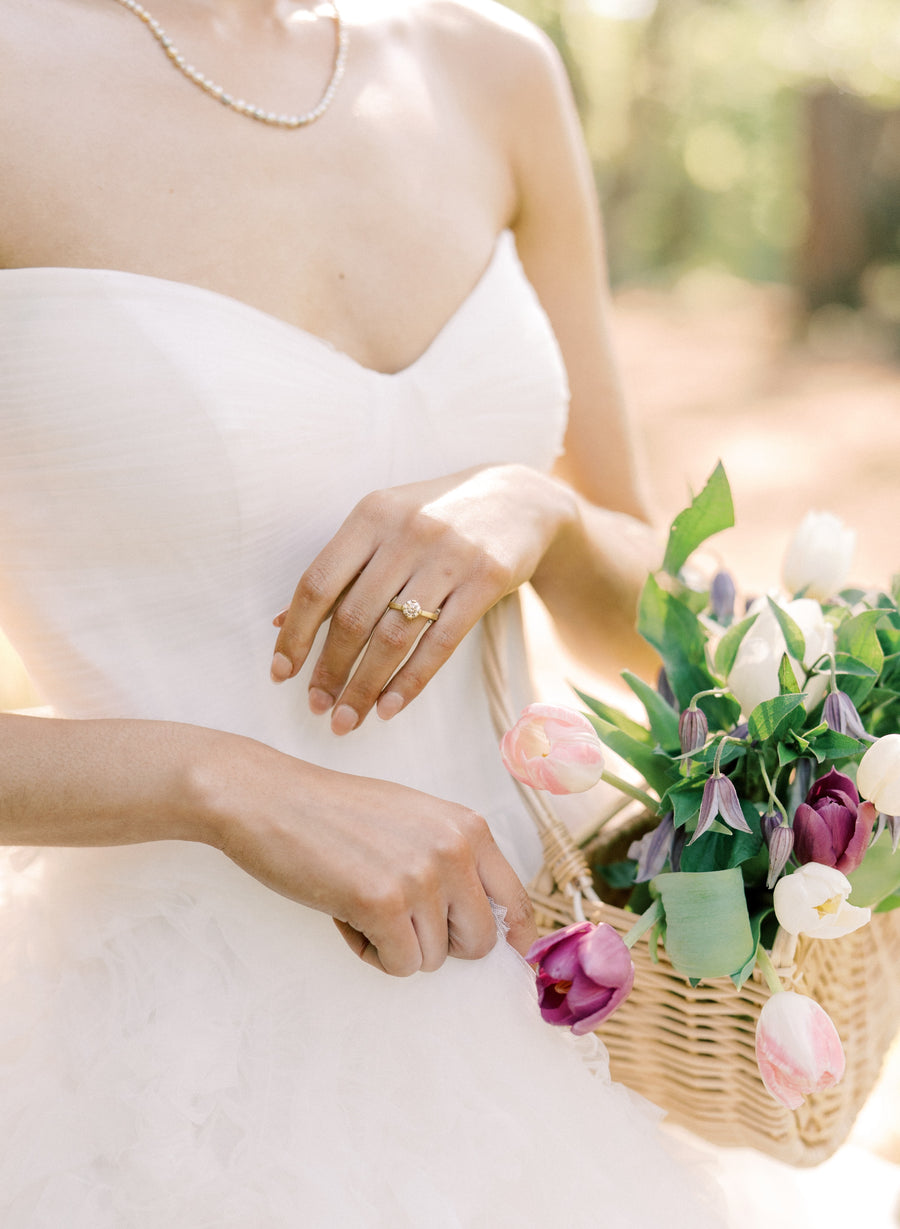 Lola Brooks diamond ring being worn outside