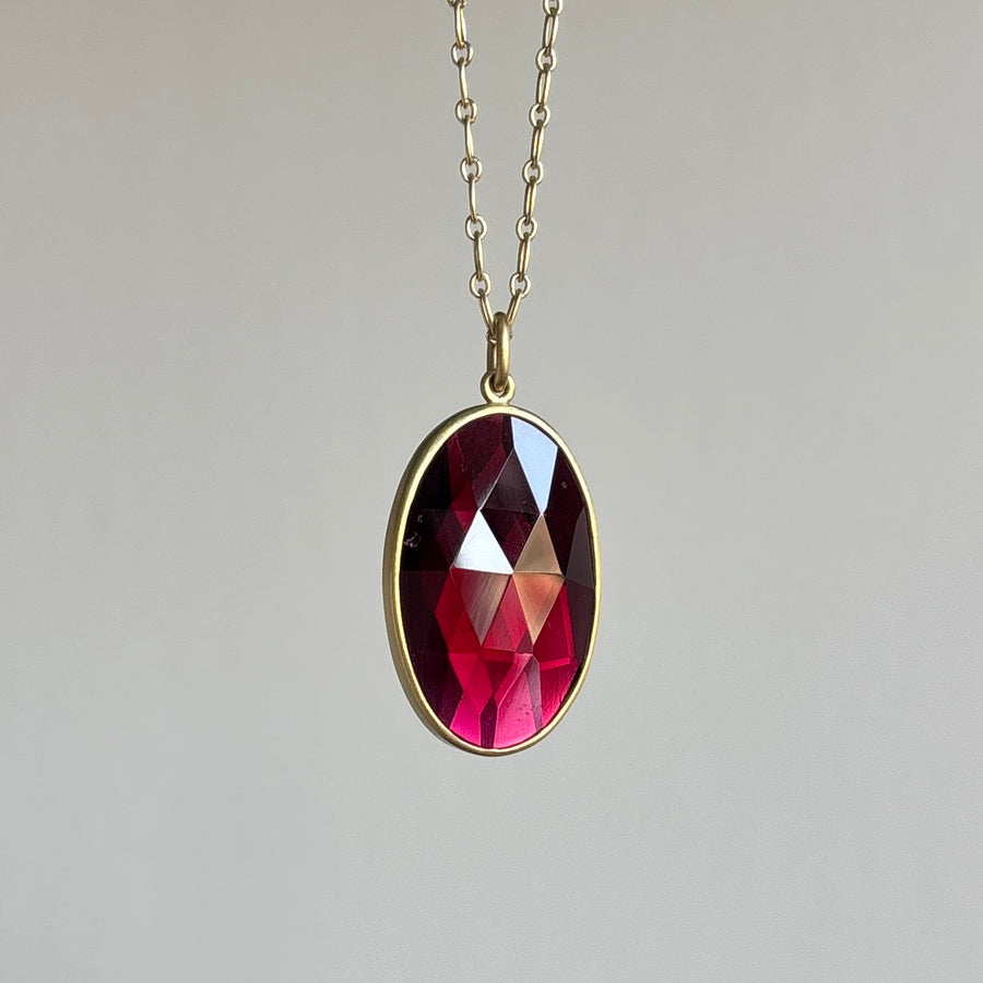 Lola Brooks Large Oval Garnet Pendant necklace hanging view 1