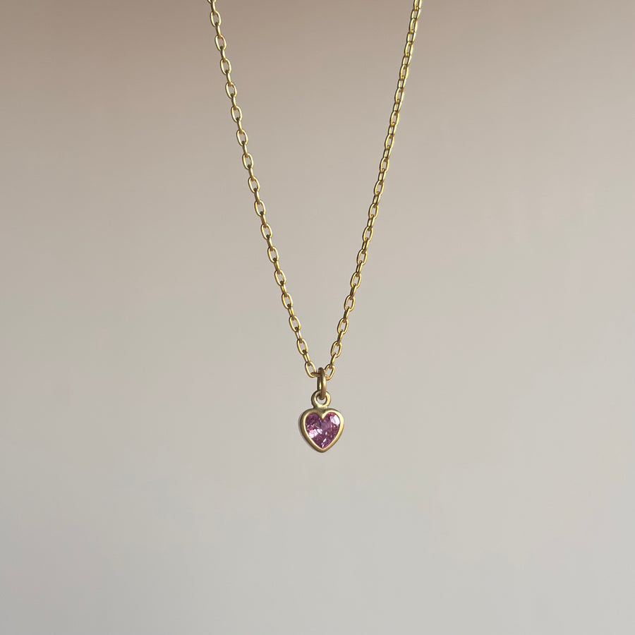 Lola Brooks Tiny Pink Sapphire Sweetheart Pendant necklace hanging view 1