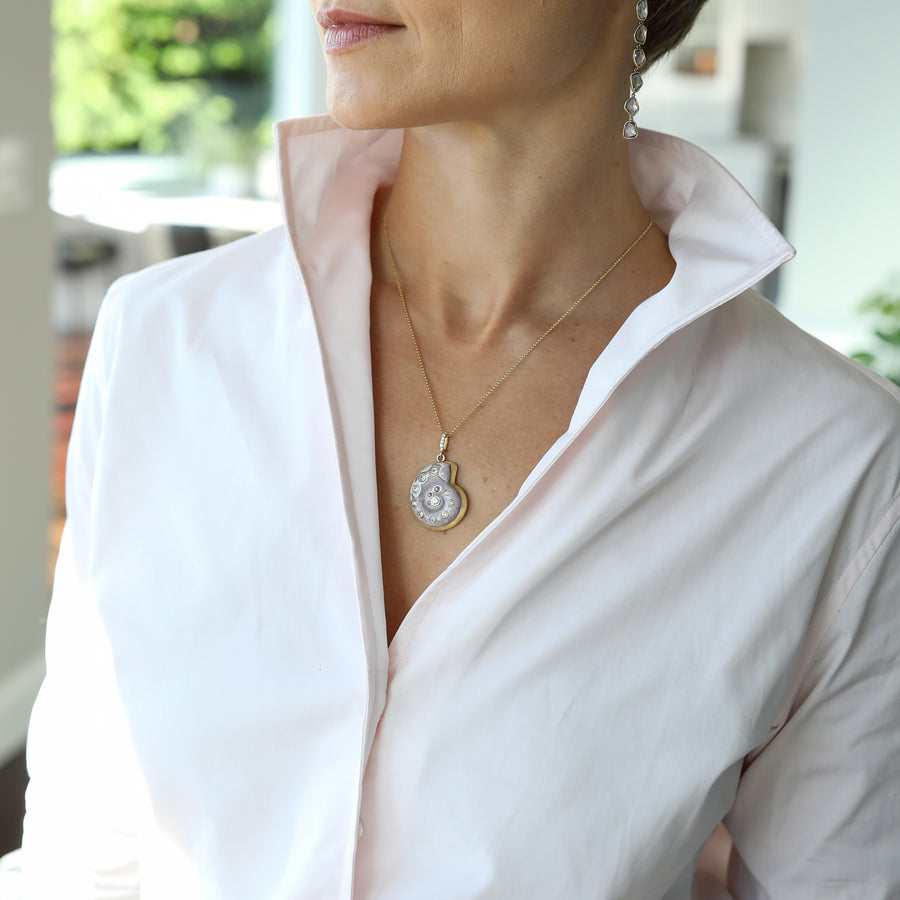 Hand Carved Laguna Agate Nautilus Pendant with Diamonds