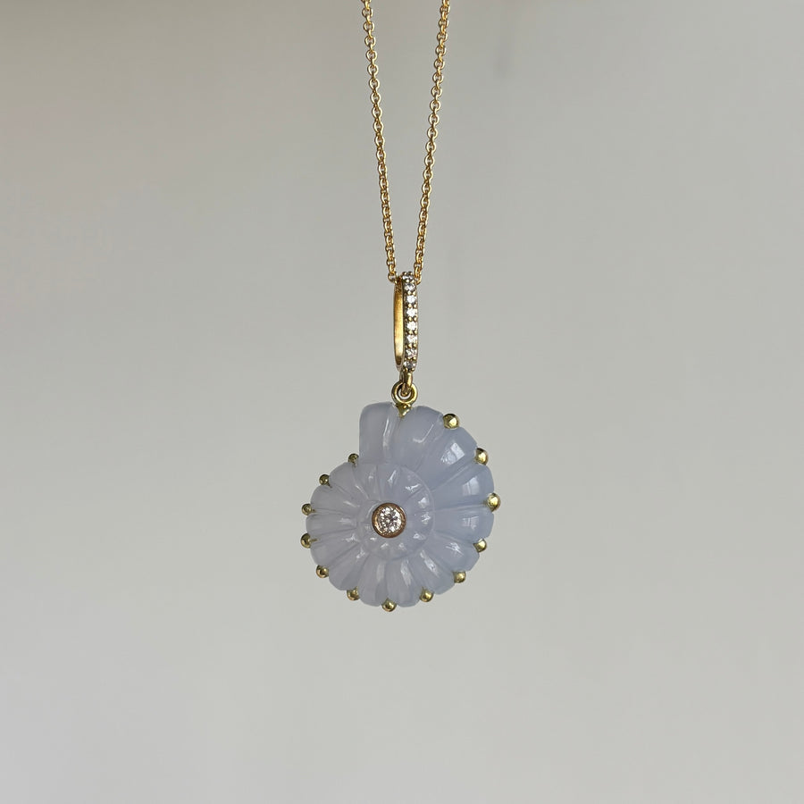 Necklace with a pendant on a light gray background