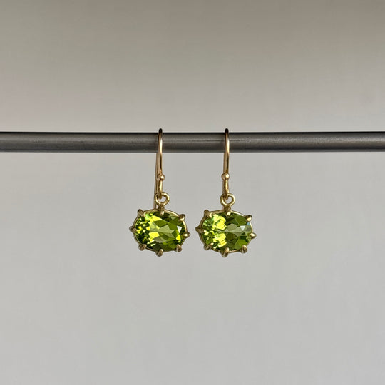 Mini 18k Gold & Oval Faceted Peridot Earrings hanging