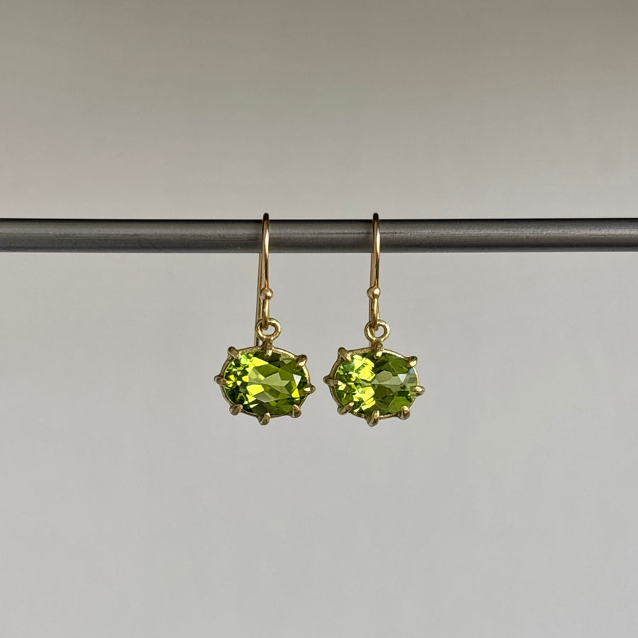 Mini 18k Gold & Oval Faceted Peridot Earrings hanging