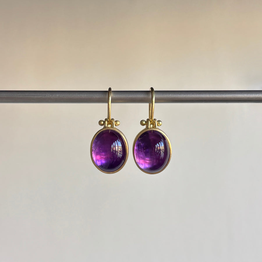 Oval Amethyst Cabochon Earrings by Monika Krol hanging view