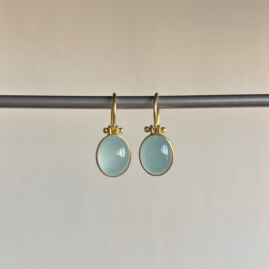 Oval Milky Aquamarine Cabochon Drop Earrings by Monika Krol hanging view