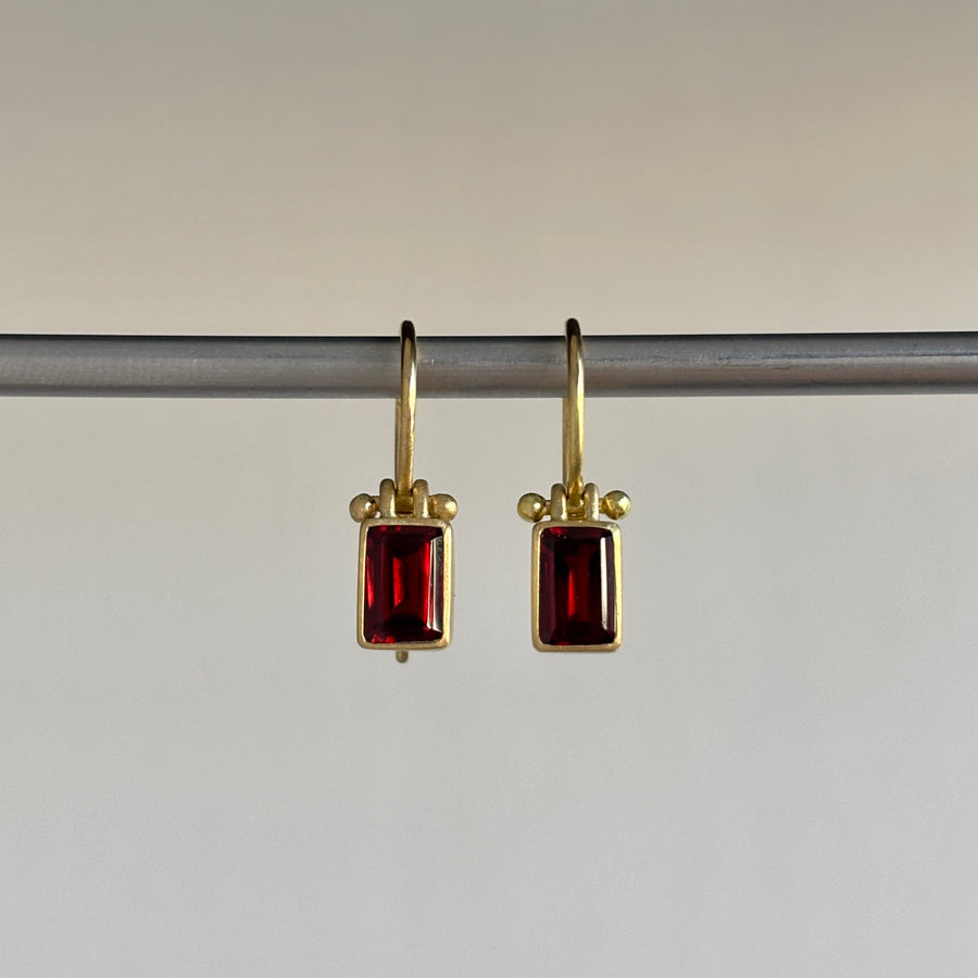 Petite Emerald Cut Garnet Earrings with Clasps by Monika Krol hanging view