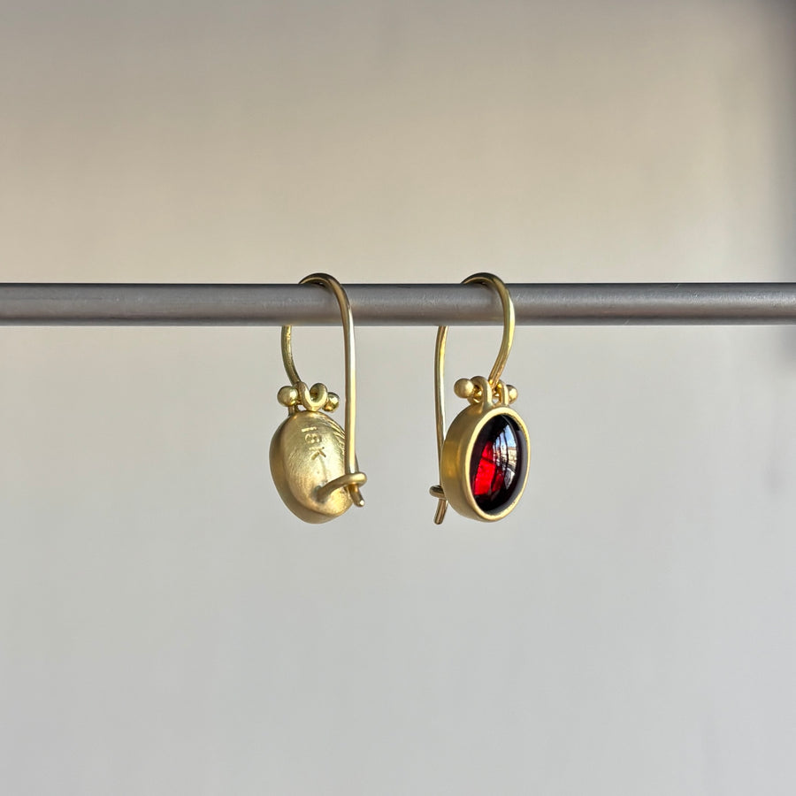 Petite Oval Garnet Cabochon Earrings with Clasps by Monika Krol side view