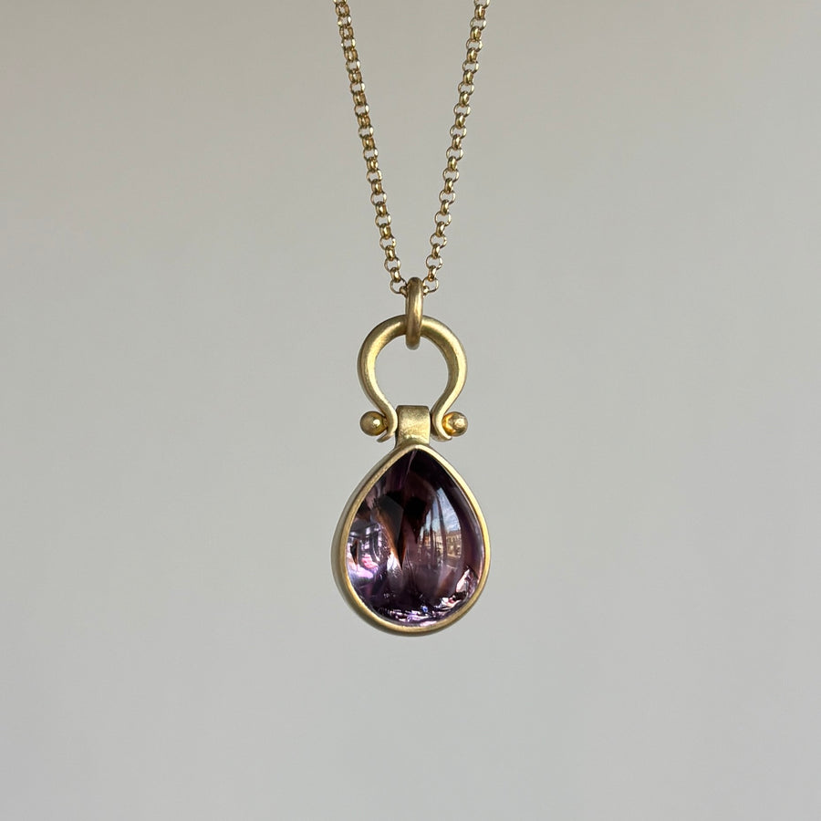 Purple-Brown Cabochon Quartz Teardrop Pendant by Monika Krol hanging view