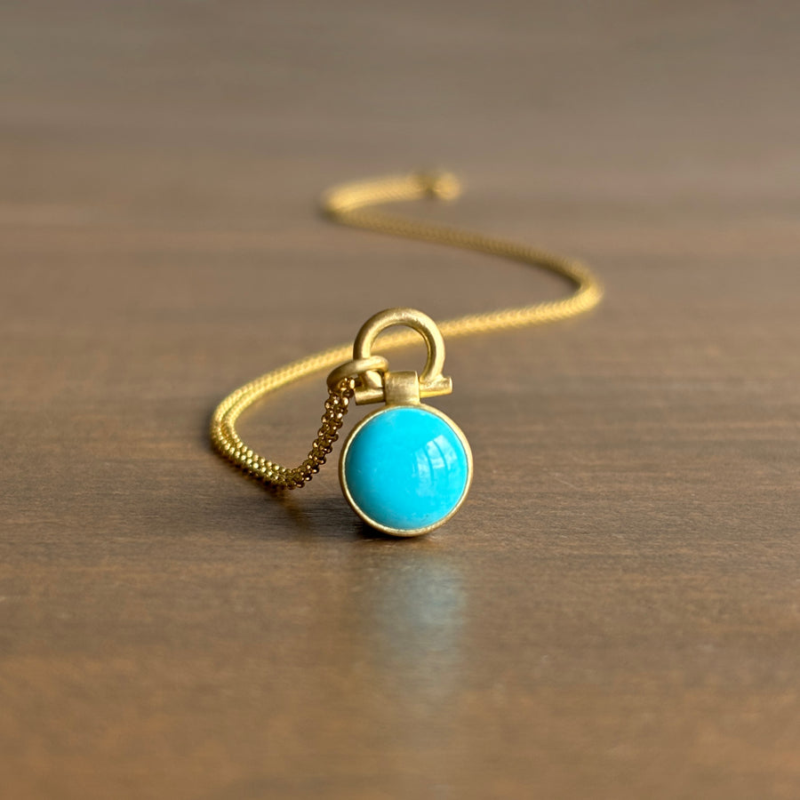 Round Sleeping Beauty Turquoise Pendant by Monika Krol