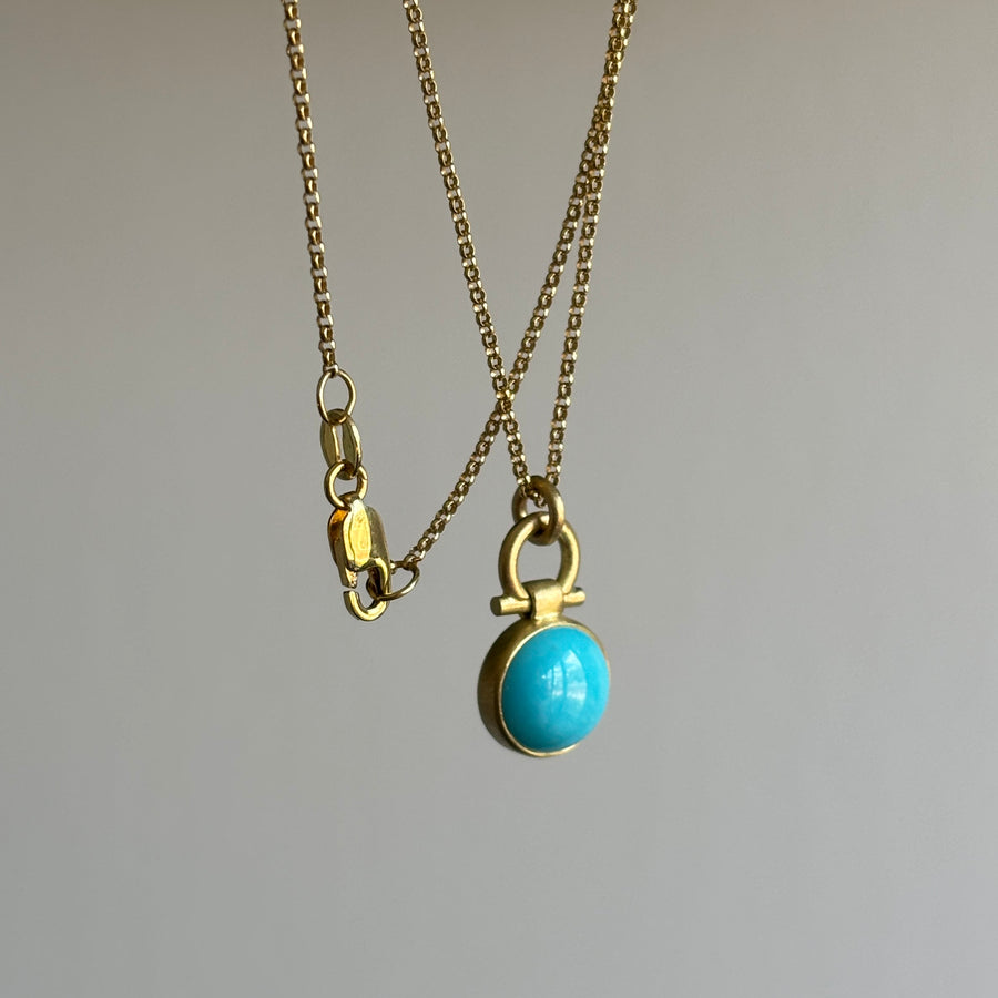 Round Sleeping Beauty Turquoise Pendant by Monika Krol side view 1