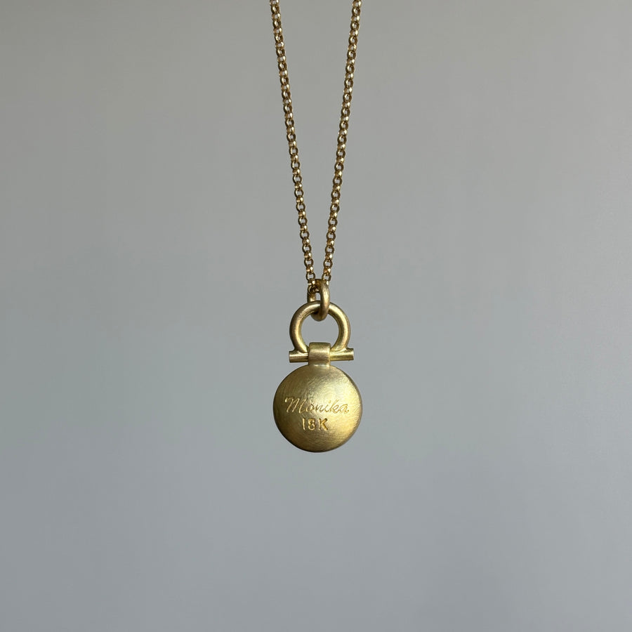 Round Sleeping Beauty Turquoise Pendant by Monika Krol side view 2