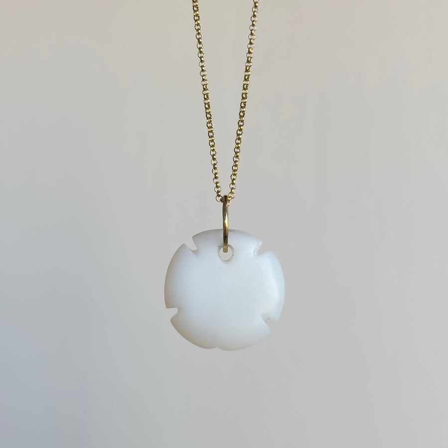 Small Hand Carved Chalcedony Sand Dollar Pendant