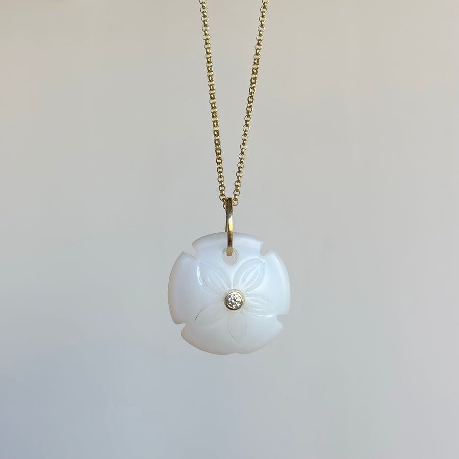 Sophie Gardner Small Hand Carved Chalcedony Sand Dollar Pendant hanging