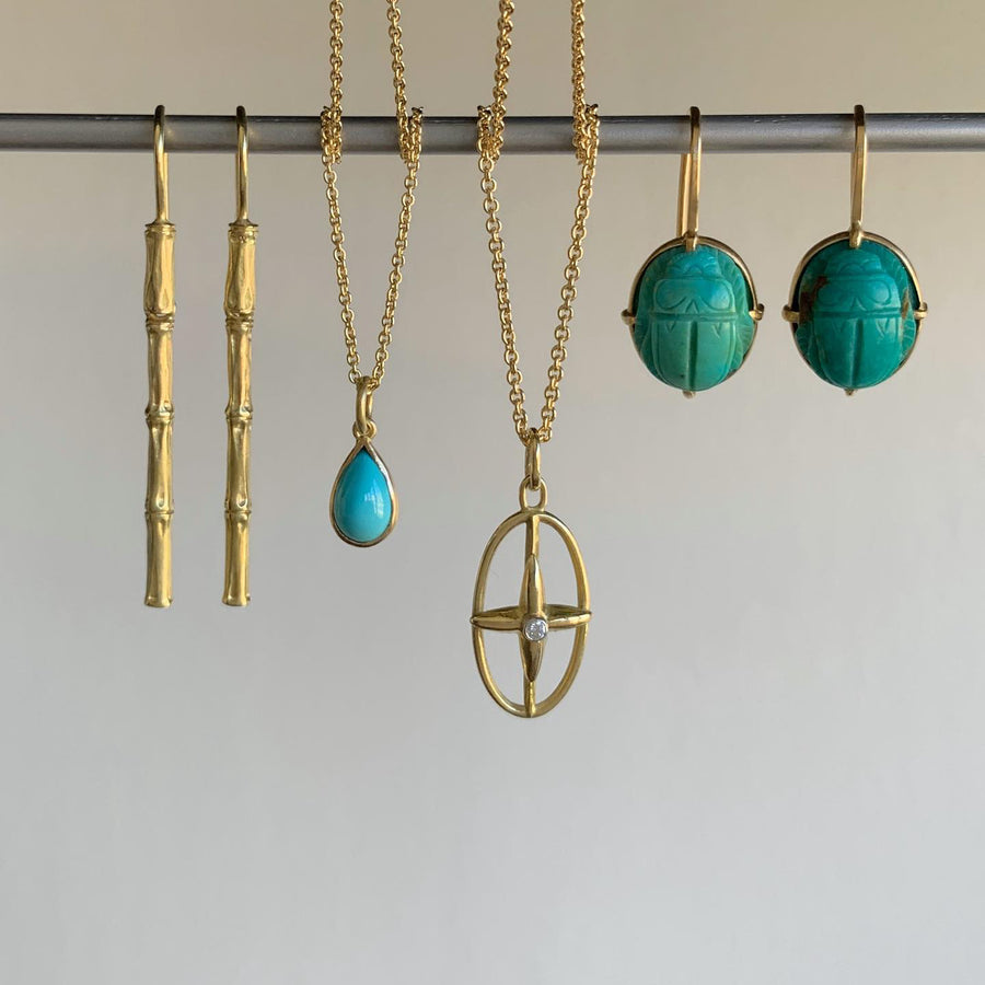 Gold Oval Star Cross Pendant