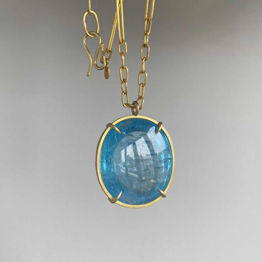 Vivid Aquamarine Cabochon Cage Set Pendant