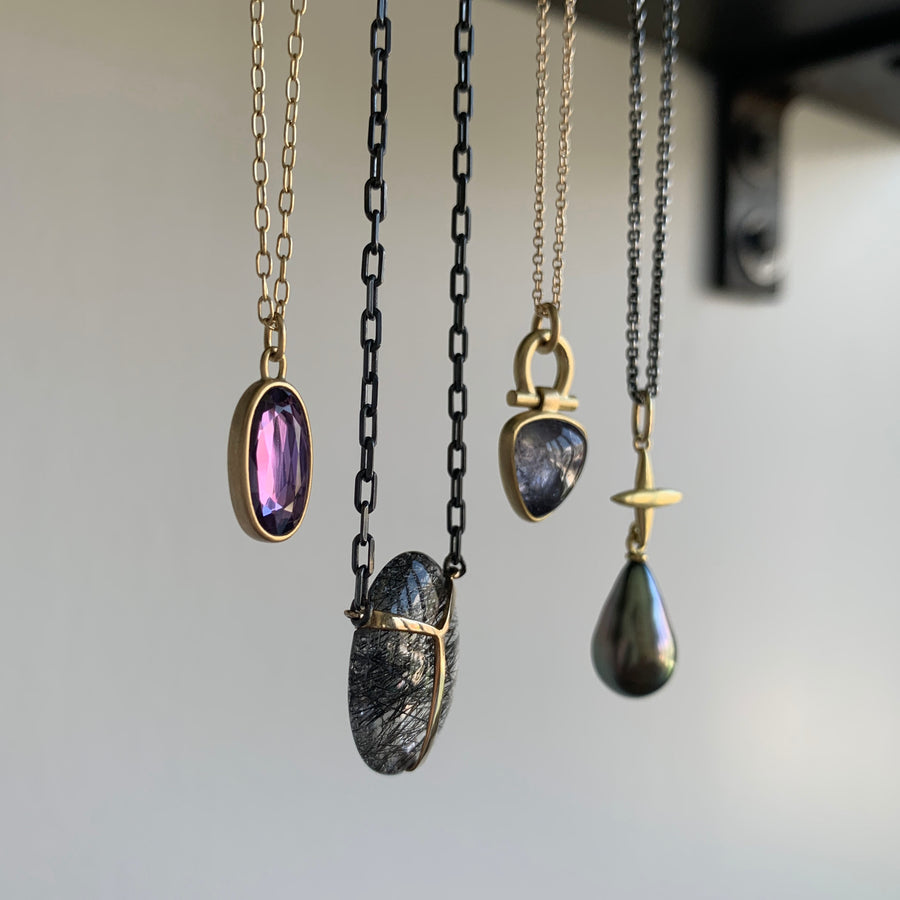 Elongated Oval Purple Sapphire Sequin Pendant