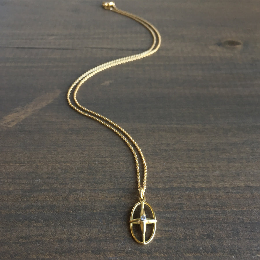 Gold Oval Star Cross Pendant