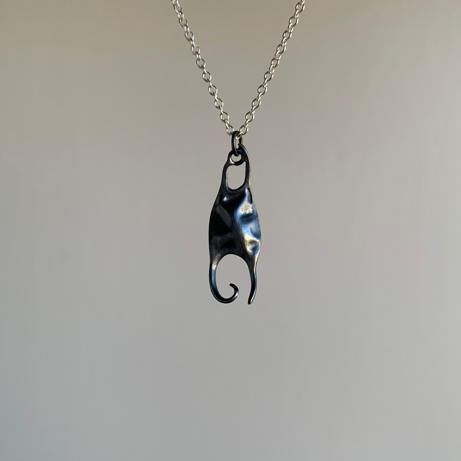 Little Silver Skate Egg Necklace