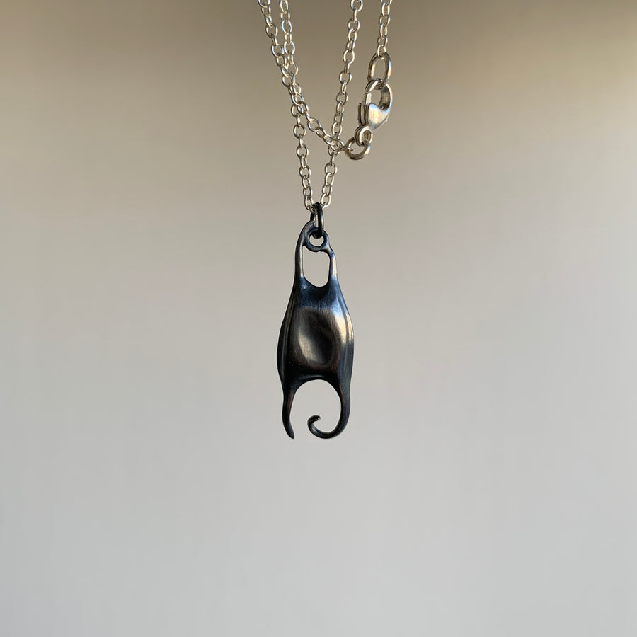 Little Silver Skate Egg Necklace
