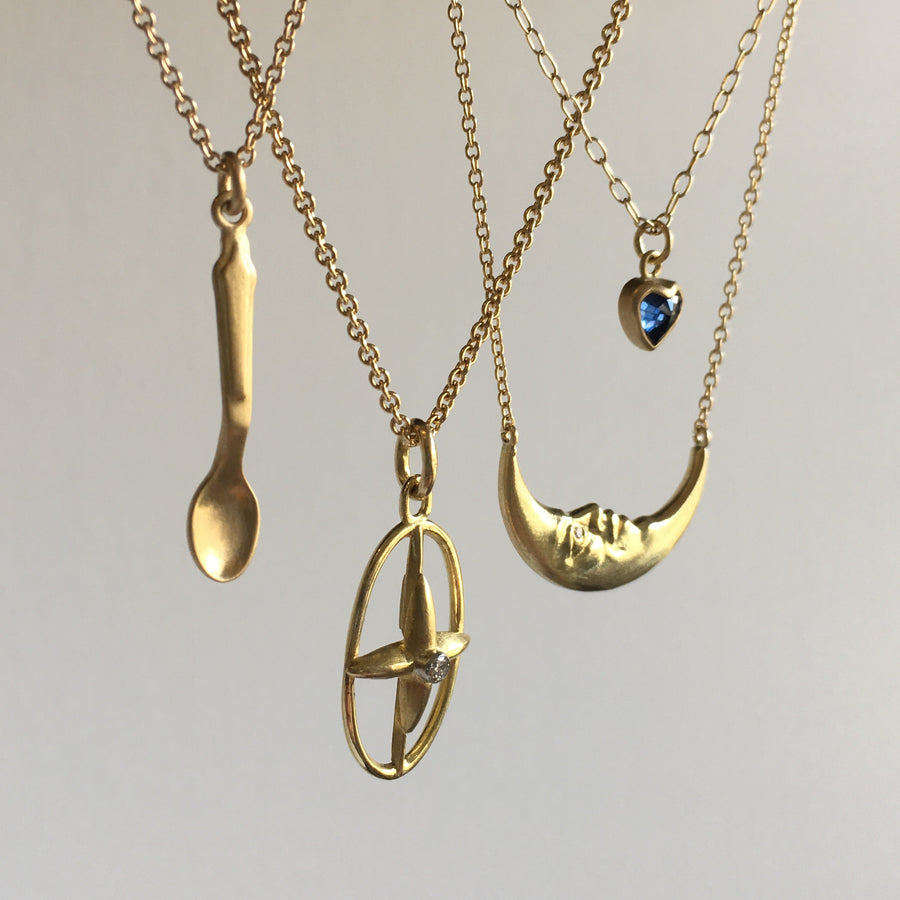 Gold Oval Star Cross Pendant